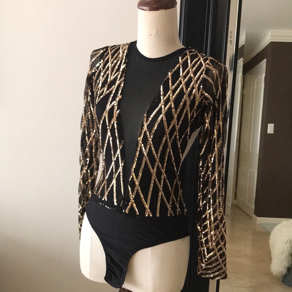 Lycra and black sequined in gold body